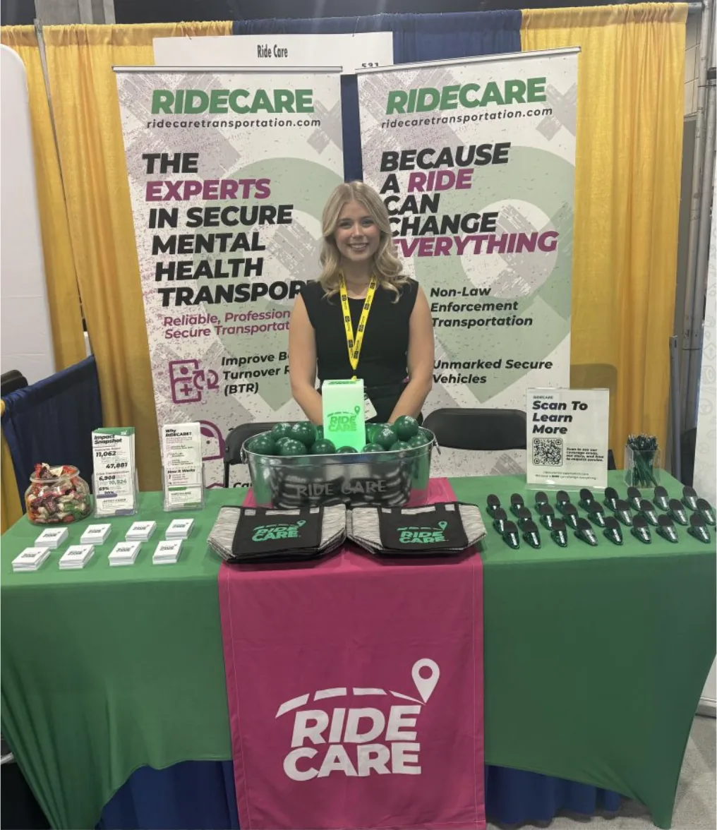 Carsyn at the RideCare booth, Kansas Hospital Association Annual Convention